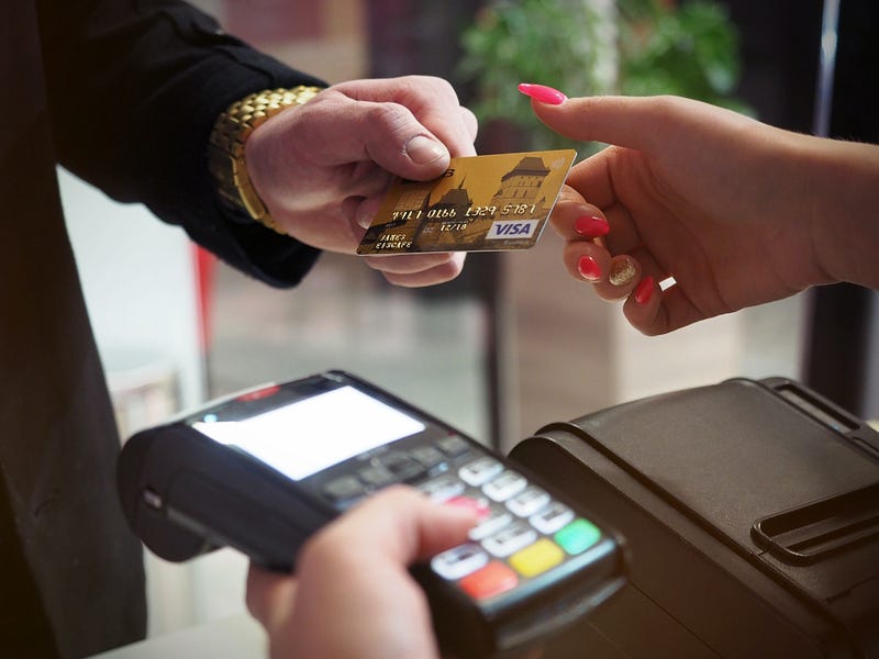 paying with a card through payment terminal